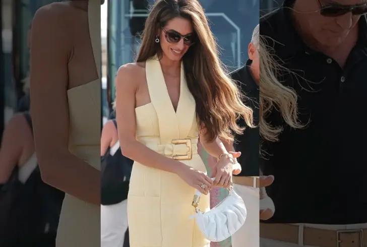 Clooney with bag earrings and watch