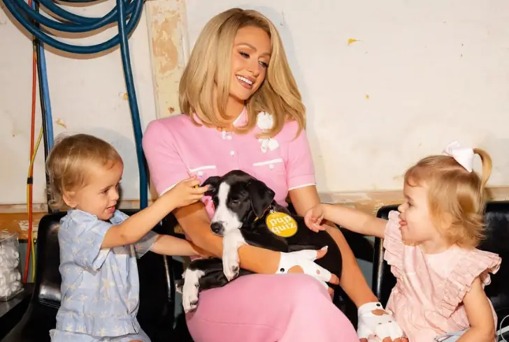 Paris Hilton with children learning